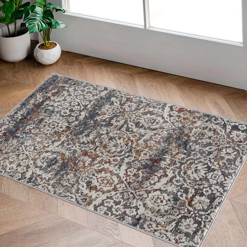 Entryway with Marden Textured Luxe Area Rug in brick red, camel, charcoal, cream, and gray on wood floor. Roomscene-Rectangle