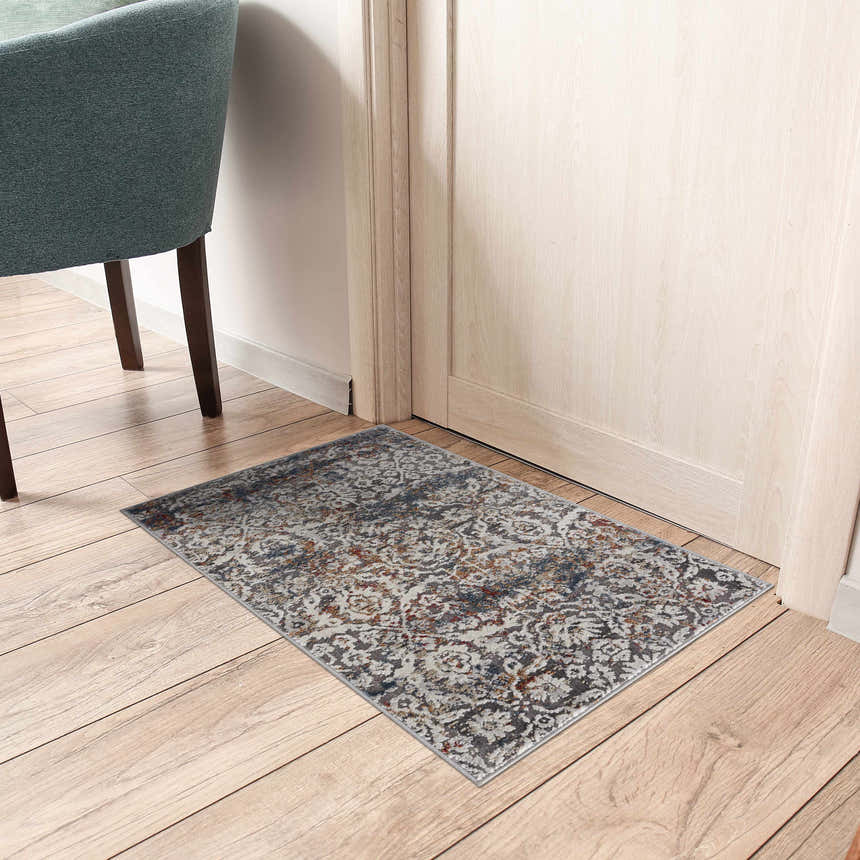 Entryway scene with a Marden Textured Luxe Area Rug in brick red, camel, and gray colors. Roomscene-Rectangle