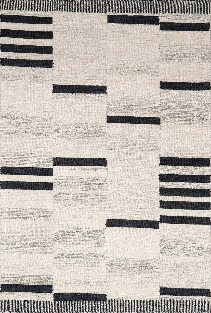 Close-up of the Aibonito Hand Tufted Wool Area Rug. Beige rug with black stripes, contemporary design. Design-Rectangle