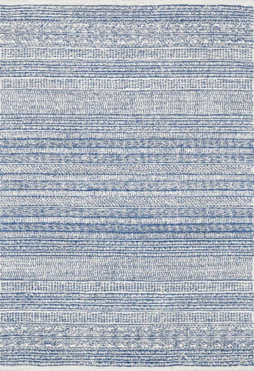 Close-up of the Allport Tufted Maroc Wool Rug. The rug has a blue and white Moroccan-inspired striped pattern. Design-Rectangle
