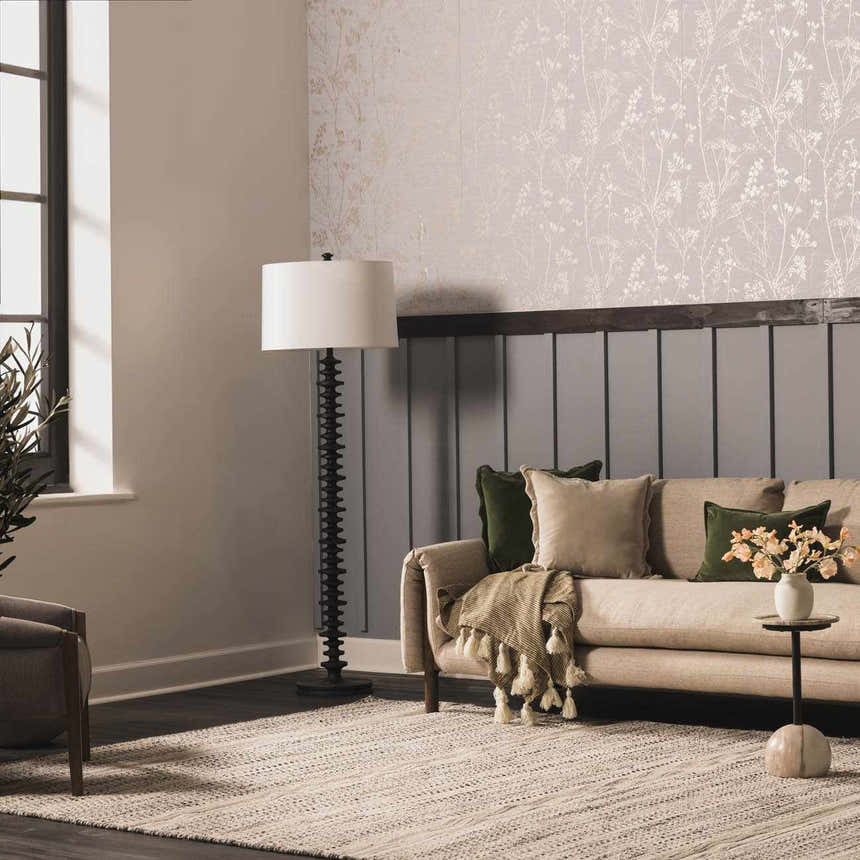 Living room scene with a beige sofa and the Arabi Wool Area Rug in light beige. Roomscene-Rectangle