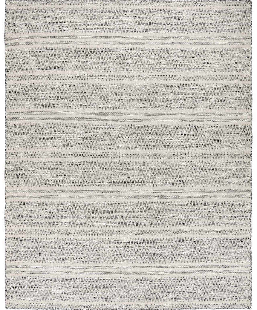 Close-up of the Arabi Wool Area Rug. Hand-woven rug with a striped pattern in black, gray, and light beige. Design-Rectangle
