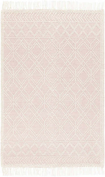 Close-up of the Ramsbury Soft Pink Wool Rug. Features a geometric diamond pattern and fringe detail. Farmhouse style. Design-Rectangle