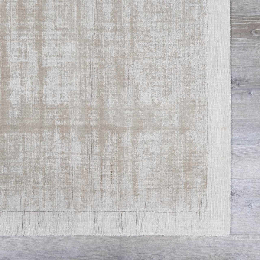 Close-up of Auchter Soli Taupe Premium Sheer Carpet showing its subtle striped pattern and soft, hand-loomed texture. Swatch