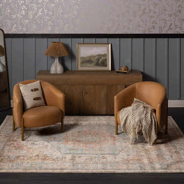 Living room scene with two leather chairs on a Vaeda Blue & Beige Thick Luxe Rug. Traditional style. Roomscene-Rectangle