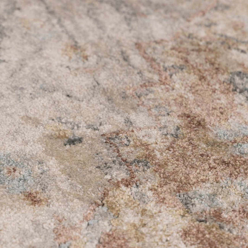 Close-up of the Vaeda Blue & Beige Thick Luxe Rug showing its beige, pink, tan, and blue traditional pattern. Texture