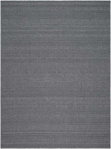Close-up of the Brayan Area Rug, a gray rug with a woven geometric pattern. Farmhouse style. Design-Rectangle-537
