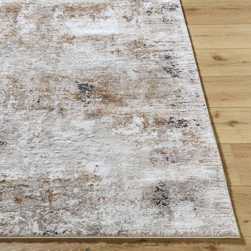 Close-up of the Weeko Luxe Thick Area Rug showing its ivory, tan, and black contemporary design and plush texture. Front
