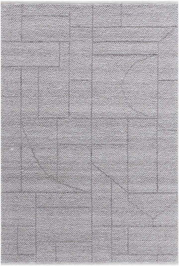 Close-up of the hand-woven Brenta Area Rug. Gray, light silver, and slate blue geometric pattern on a textured, recycled PET yarn. Design-Rectangle-576
