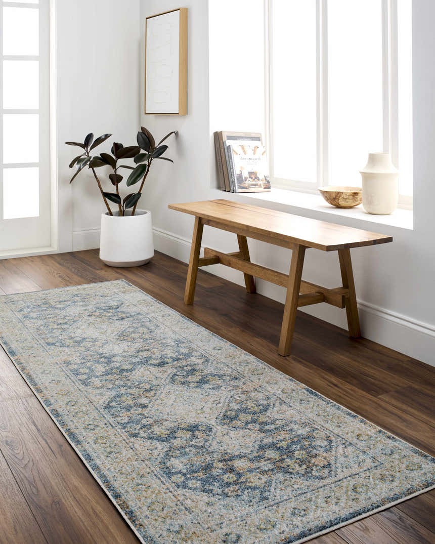 Entryway with Bhavya Navy Washable Area Rug runner, wood bench, dark wood floors, and neutral decor. Roomscene-Runner