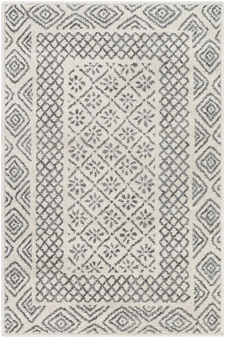 Close-up of the Livabliss Bahar BHR-2321 area rug, showing its charcoal and off-white geometric and floral pattern. Design-Rectangle-23
