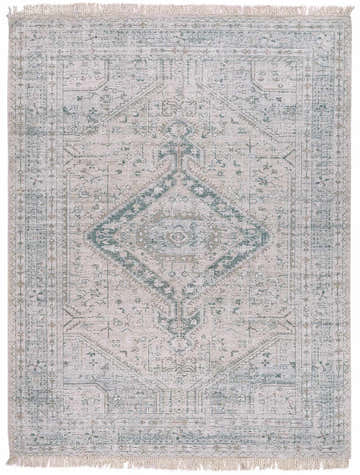Close-up of the Birdham Handmade Cotton-blend Rug. Bohemian style with dark green diamond pattern and fringe. Design-Rectangle