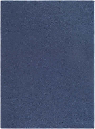 Close-up of the hand woven Breena Indigo Washable Area Rug, showing indigo, midnight, and slate blue colors. Design-Rectangle-57