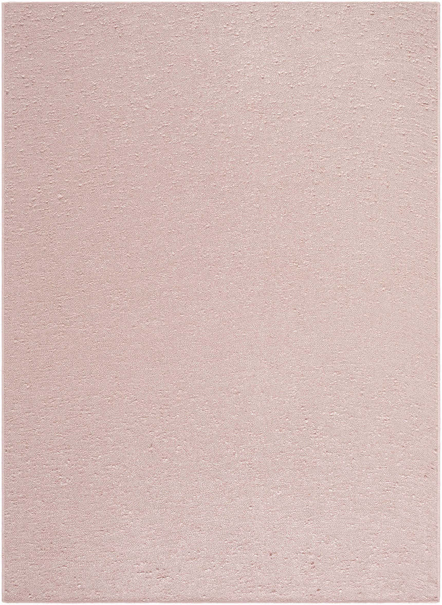 Close-up of the Breena Blush Washable Area Rug. The rug has a subtle woven texture in a soft blush pink color. Design-Rectangle-57
