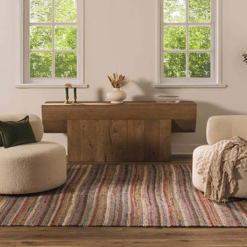 Entryway with a wood console table and the striped Brenda Crimson Area Rug between two armchairs. Roomscene-Rectangle