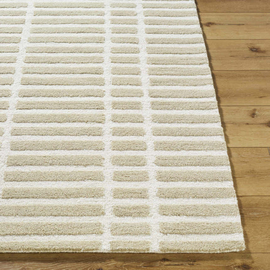 Close-up of the Bendek Beige Area Rug, a hand-tufted wool rug with a contemporary beige and ivory block pattern. Front