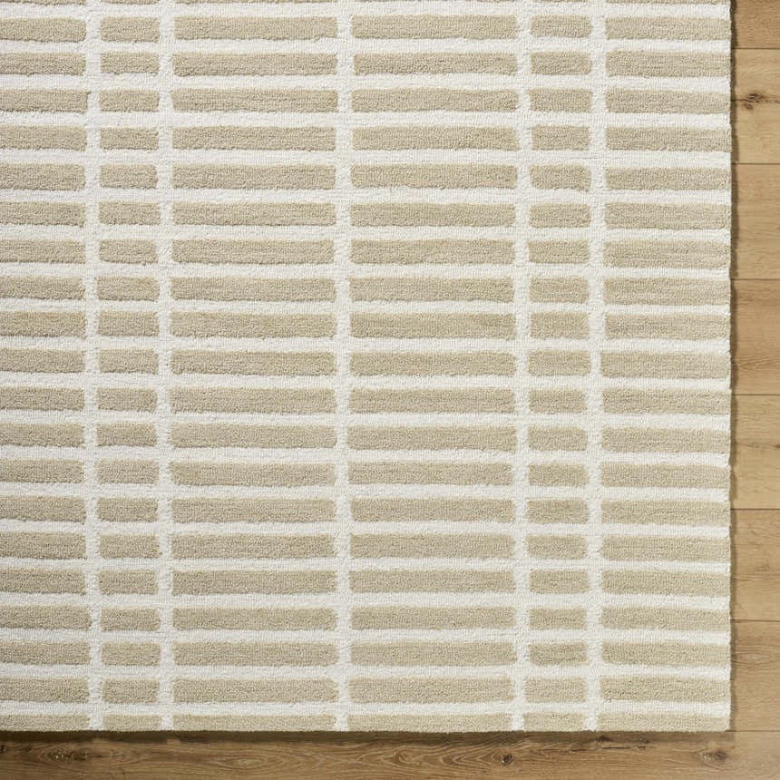 Close up of the Bendek Beige Area Rug showing a contemporary beige and ivory brick pattern and wool texture. Corner