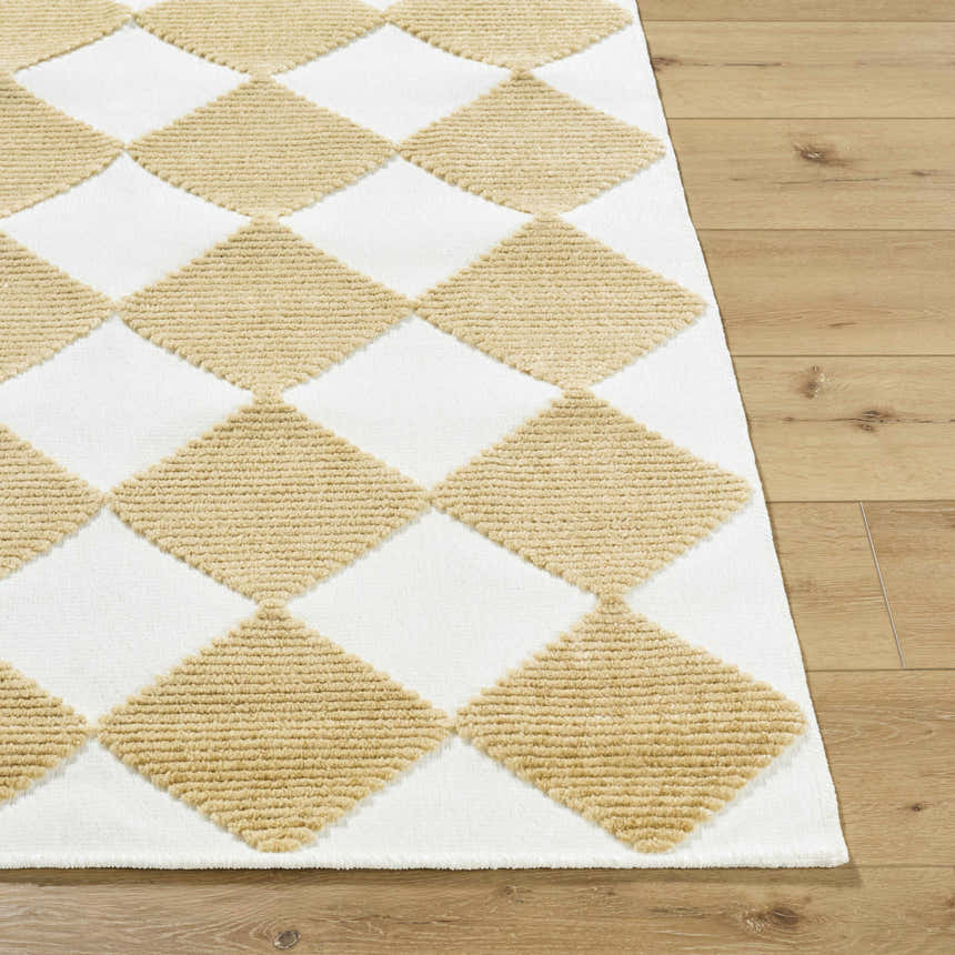 Close-up of the Bosley White Washable Area Rug. Mustard diamond pattern on a white background. Contemporary style. Front