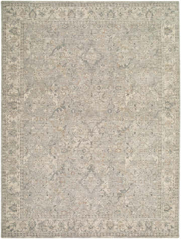 Close-up of Brynja Slate Blue Area Rug. Traditional, farmhouse style rug with cream, green, and slate blue floral pattern. Design-Rectangle-710102
