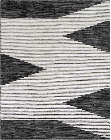 Close-up of the hand-woven Bushwick Area Rug. Black and cream wool forms a geometric, striped pattern. Design-Rectangle-810