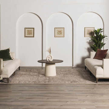 Living room scene with the Collins Avenue II Vintage Oushak rug, sofas, round table, and framed art in a neutral color palette. Roomscene-Rectangle