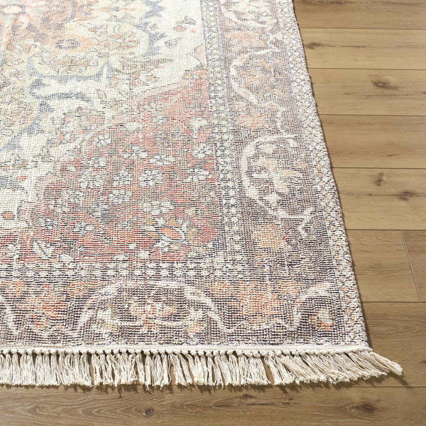Close-up of the hand-loomed Bohdan Terracotta Area Rug showing its charcoal, ivory, and terracotta traditional pattern. Front