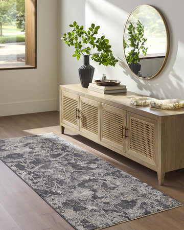 Entryway with Breeda Black Area Rug runner, wood console table, round mirror, and hardwood floors. Roomscene-Runner