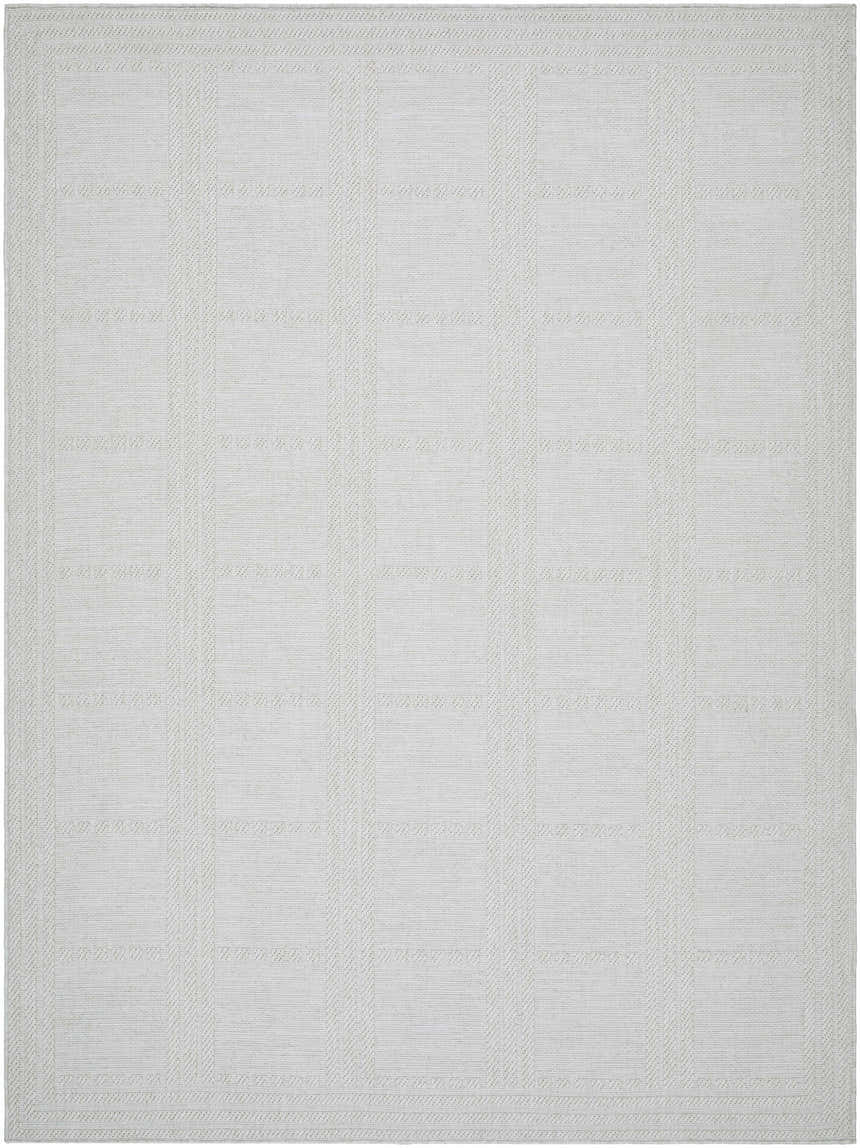 Close-up of the Bahari Area Rug, light silver and silver gray with a subtle geometric pattern and woven texture. Design-Rectangle-537