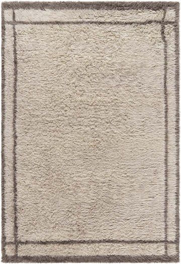 Close-up of the Aidric Area Rug. Hand-tufted wool rug in ash and gray with a simple, framed border design. Soft texture. Design-Rectangle-576
