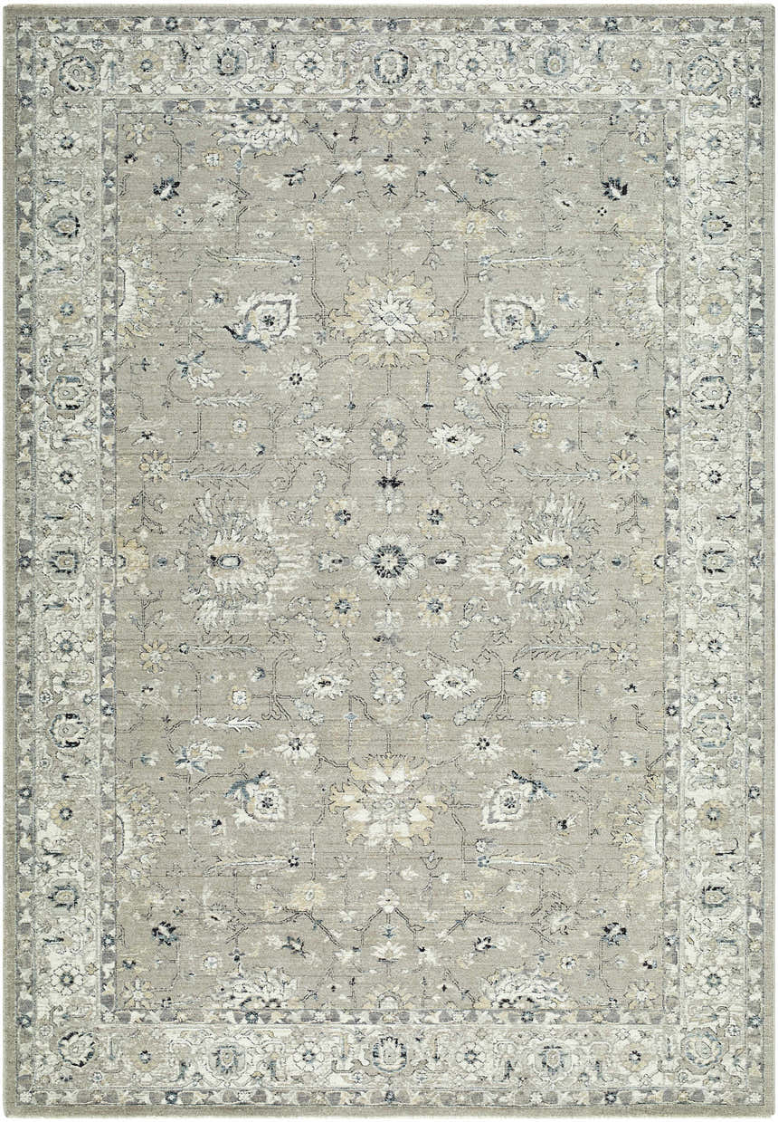 Close-up of the Briony Area Rug. Farmhouse style with a traditional floral pattern in neutral gray, cream, and blue tones. Design-Rectangle-6796