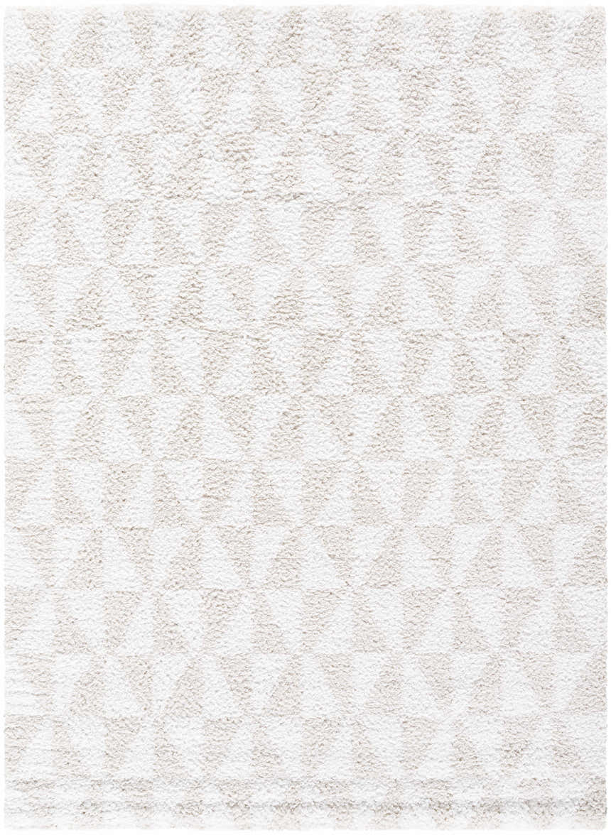 Close-up of the Ceylan Area Rug; a shag rug in medium gray and white with a subtle geometric pattern. Design-Rectangle-537