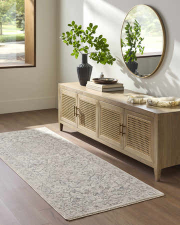Entryway scene with a tan console table, round mirror, and the Corina Charcoal Area Rug runner. Roomscene-Runner