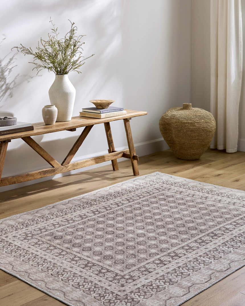 Entryway with Rainier Light Brown Washable Rug, wood bench with vases, and woven basket for a farmhouse feel. Roomscene-Rectangle