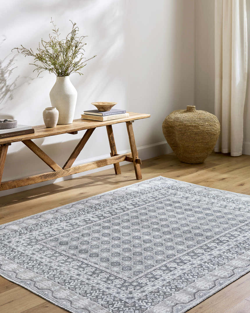 Entryway with Rainier Gray Washable Rug. Farmhouse style with wood bench, vases, and woven basket. Neutral tones. Roomscene-Rectangle