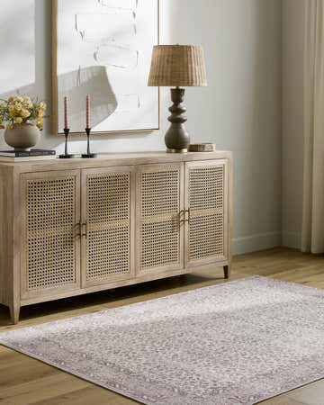 Farmhouse living room scene with a Spokane Brown Area Rug, light wood floors, and a rattan sideboard. Roomscene-Rectangle