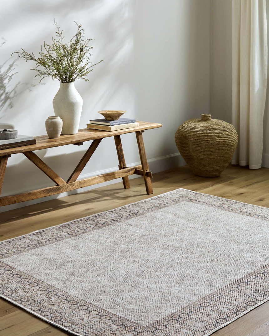 Entryway with Rainier Cottage Border Beige Washable Rug, wood bench, vases, and woven basket for a farmhouse feel. Roomscene-Rectangle
