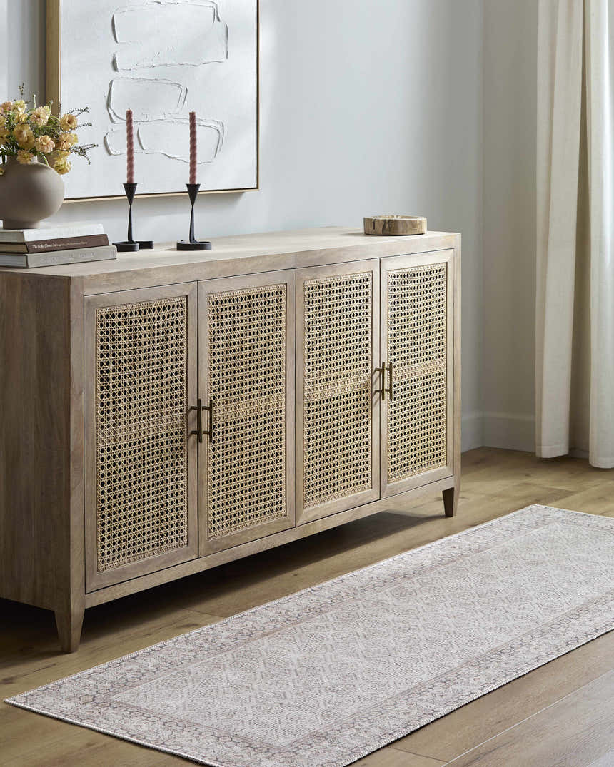 Entryway with a beige Rainier Cottage Border Washable Rug, light wood floors, and a matching cabinet. Roomscene-Runner