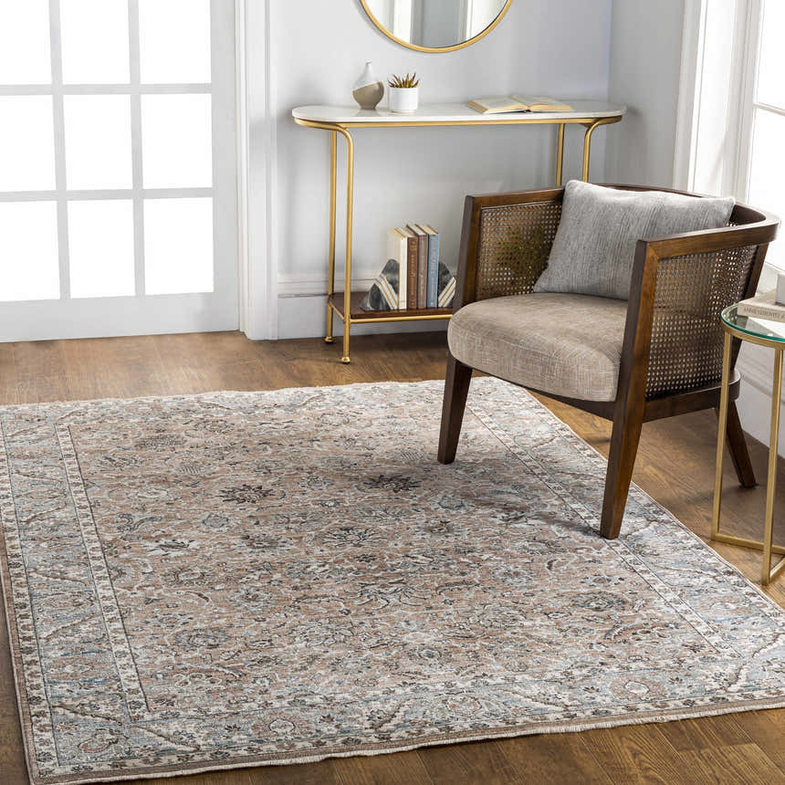 Entryway with a traditional Civankan Area Rug in brick red, denim, and ivory under a chair and console table. Roomscene-Rectangle