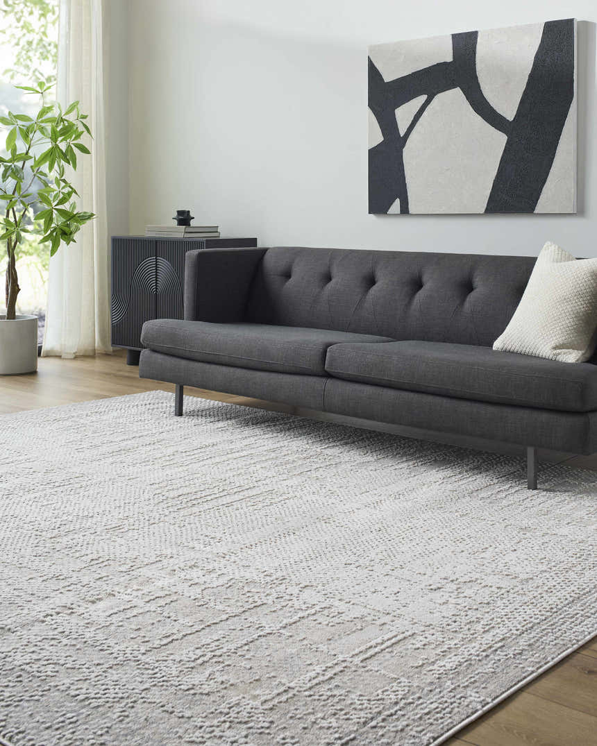 Living room scene with gray sofa and Colson Sage Area Rug in ash and pale pink. Roomscene-Rectangle