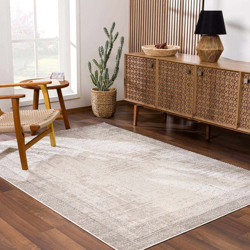 Living room scene with Colson Sage Area Rug, wood furniture, and neutral tones. Roomscene-Rectangle