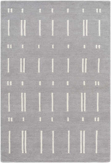 Close-up of the Charan Slate Gray Area Rug. Hand-tufted wool rug with a slate gray background and ivory geometric pattern. Design-Rectangle-576