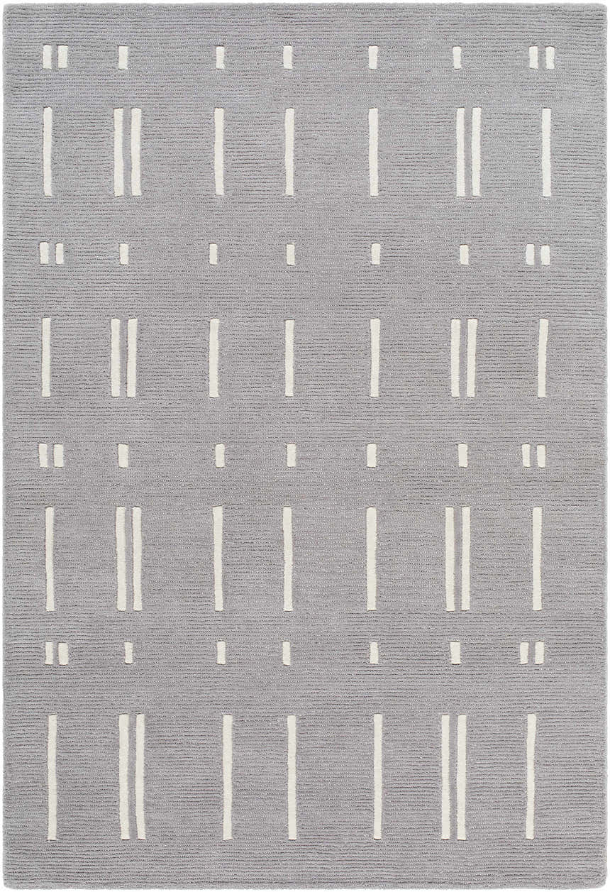 Close-up of the Charan Slate Gray Area Rug. Hand-tufted wool rug with a slate gray background and ivory geometric pattern. Design-Rectangle-576