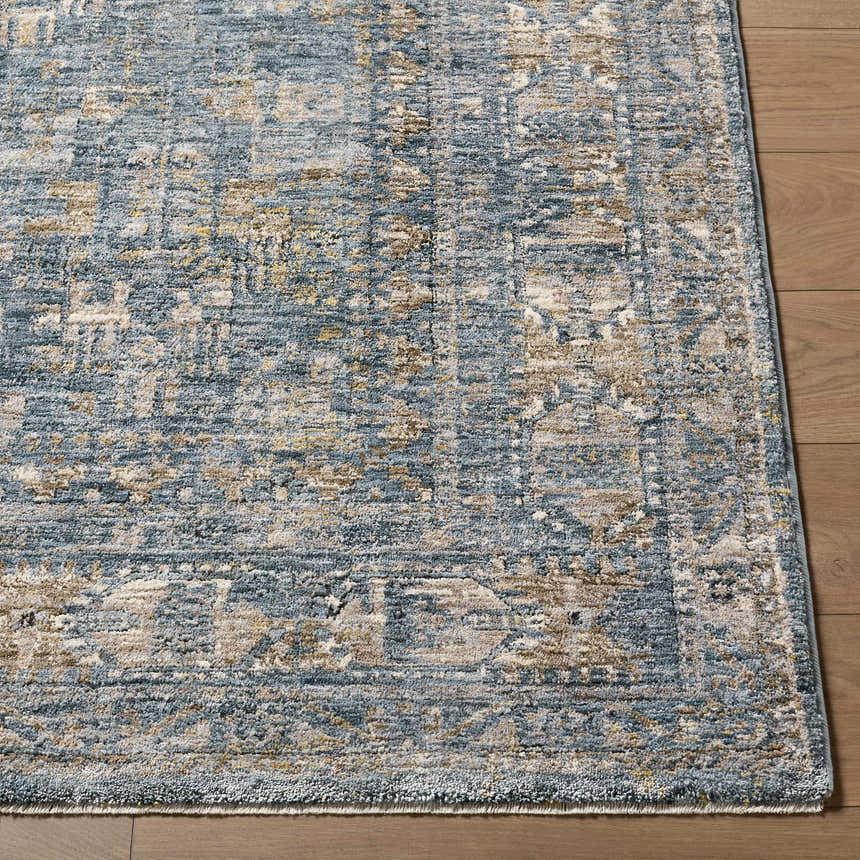 Close up of the Mirabel Denim Blue Traditional Rug showing the texture and pattern. Front