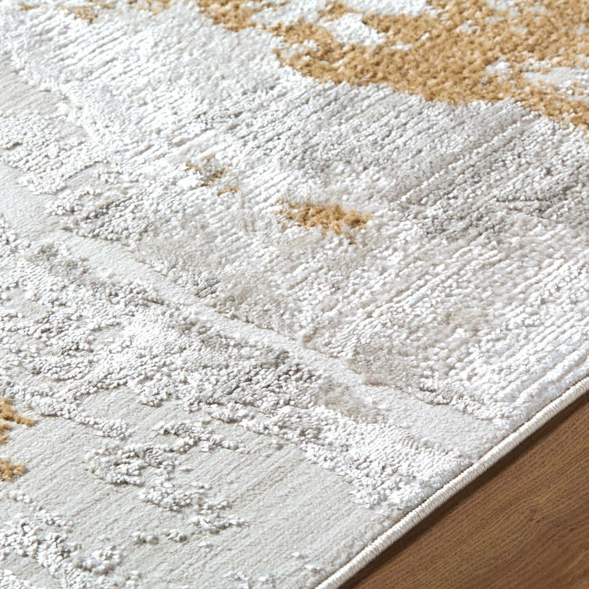 Close up of the Chroma Area Rug showing ivory, light gray, and mustard colors with a contemporary design. Texture
