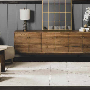 Living room scene with Modern Scandi Architect V Area Rug, wood console table, lamp, and grid mirror. Black and ivory rug. Roomscene-Rectangle