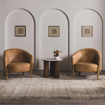 Living room scene with camel chairs and Galey Alix x Livabliss Myrtle Avenue IV rug in cream and dark brown. Roomscene-Rectangle