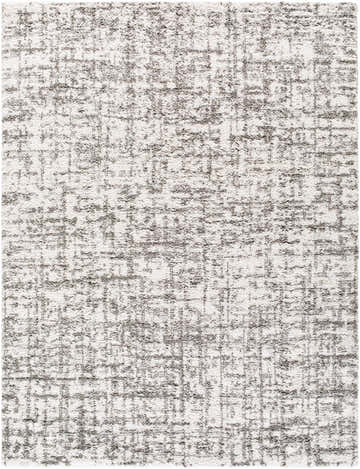 Close-up of the Candra Area Rug; a shag rug in charcoal and white with a subtle grid pattern. Design-Rectangle-710