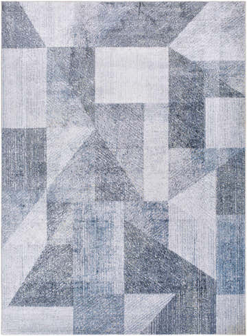 Close-up of the Chachi Washable Geometric Rug; abstract pattern in gray, light gray, navy, and slate blue hues. Design-Rectangle-537