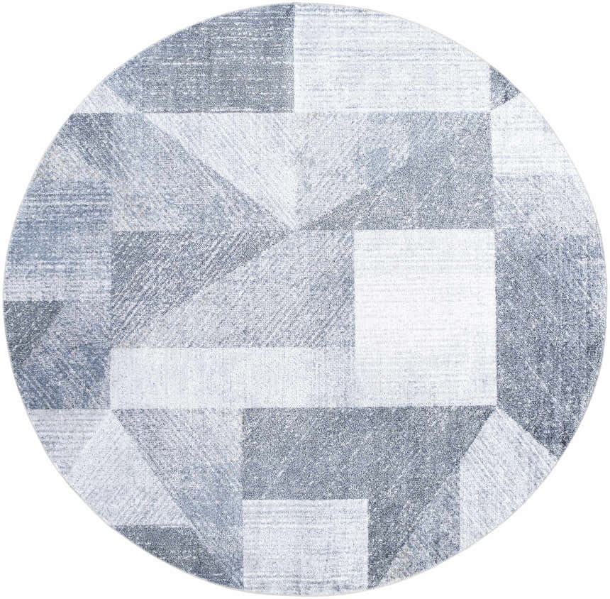 Close-up of round Chachi Washable Geometric Rug; gray, light gray, navy, and slate blue geometric pattern. Design-Round-67