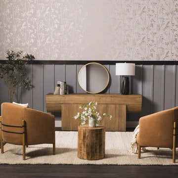 Living room scene with a Clarke Textured Braided Stripe rug, brown leather chairs, and a rustic wood console table. Roomscene-Rectangle